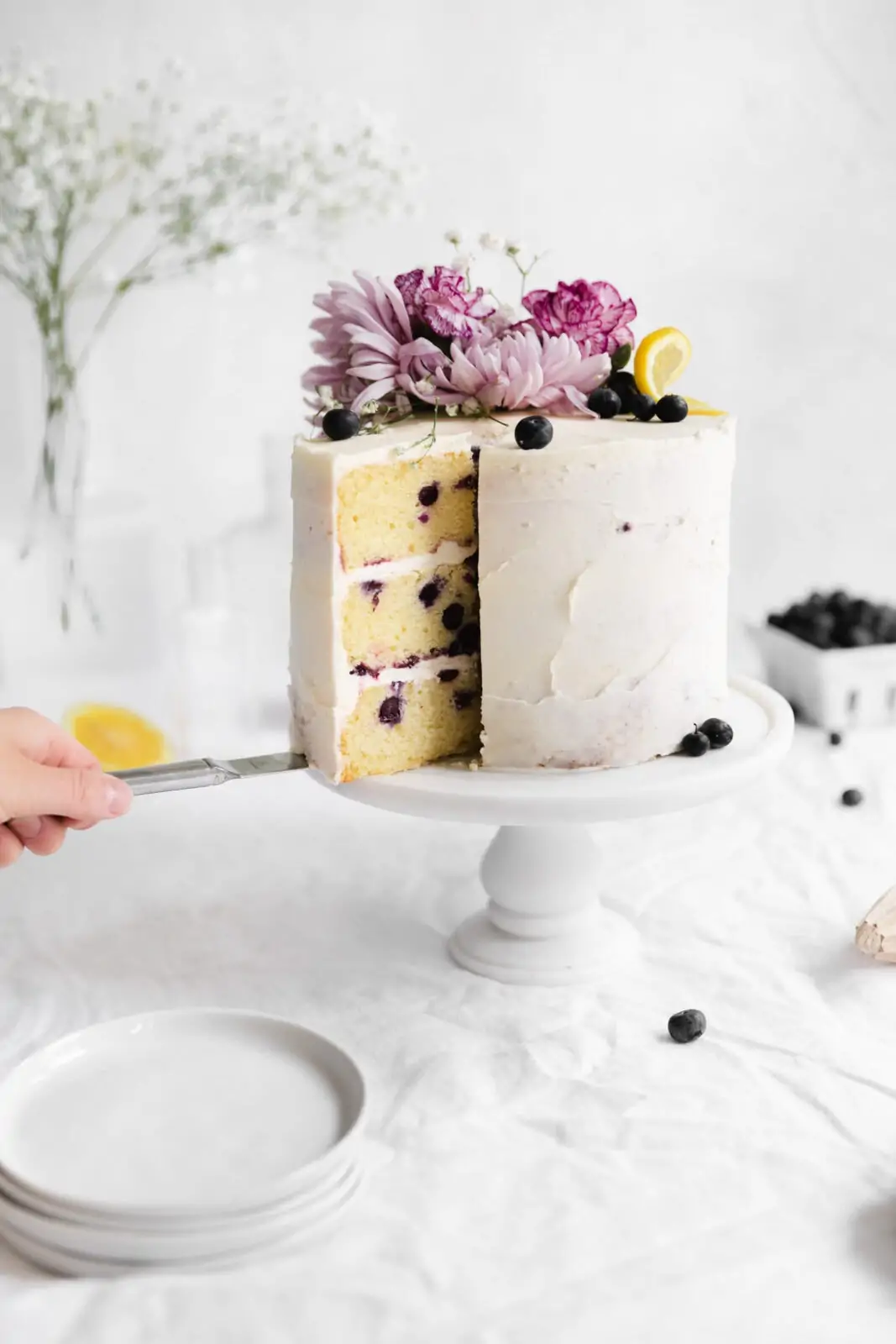 lemon blueberry layer cake with flowers