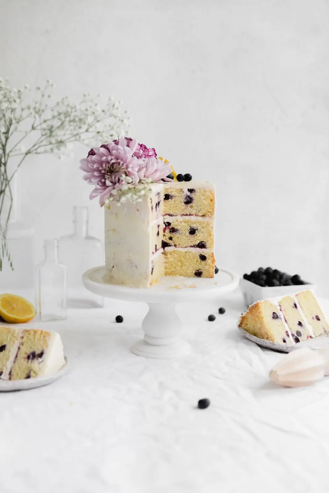 lemon blueberry cake with slices taken out