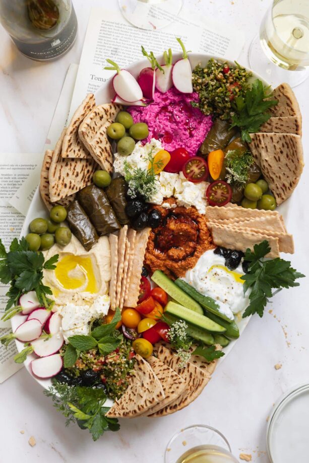 mezze platter with veggies, pita, olives and spreads
