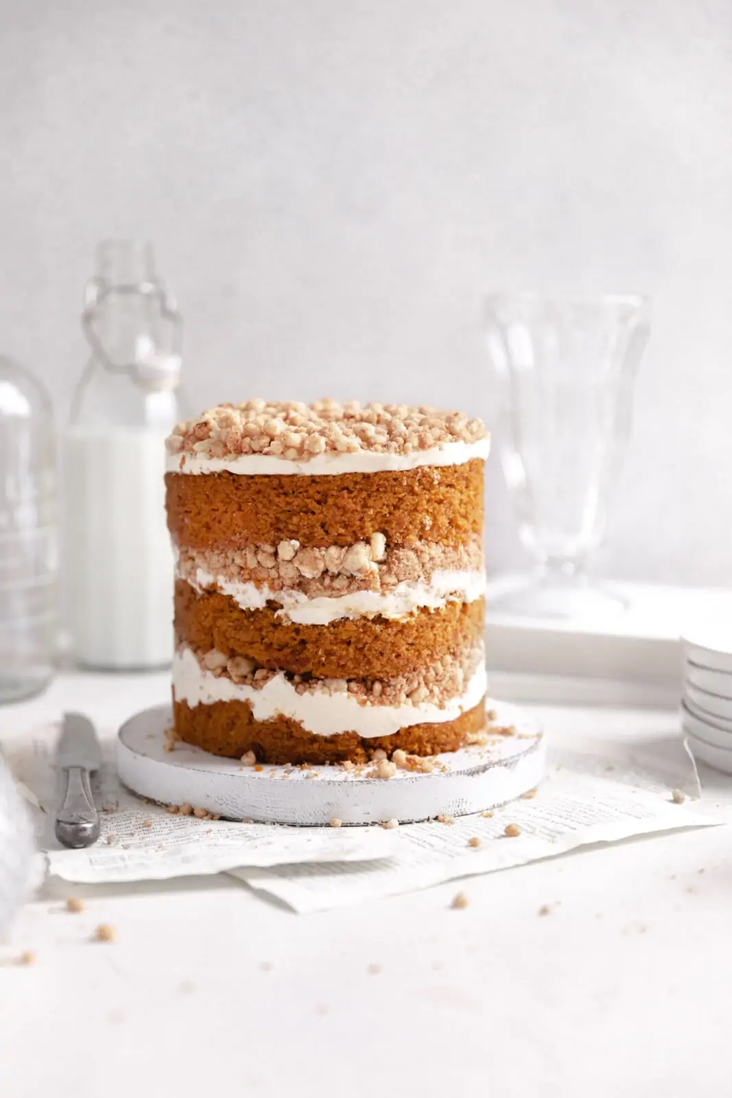 pumpkin streusel layer cake on stand