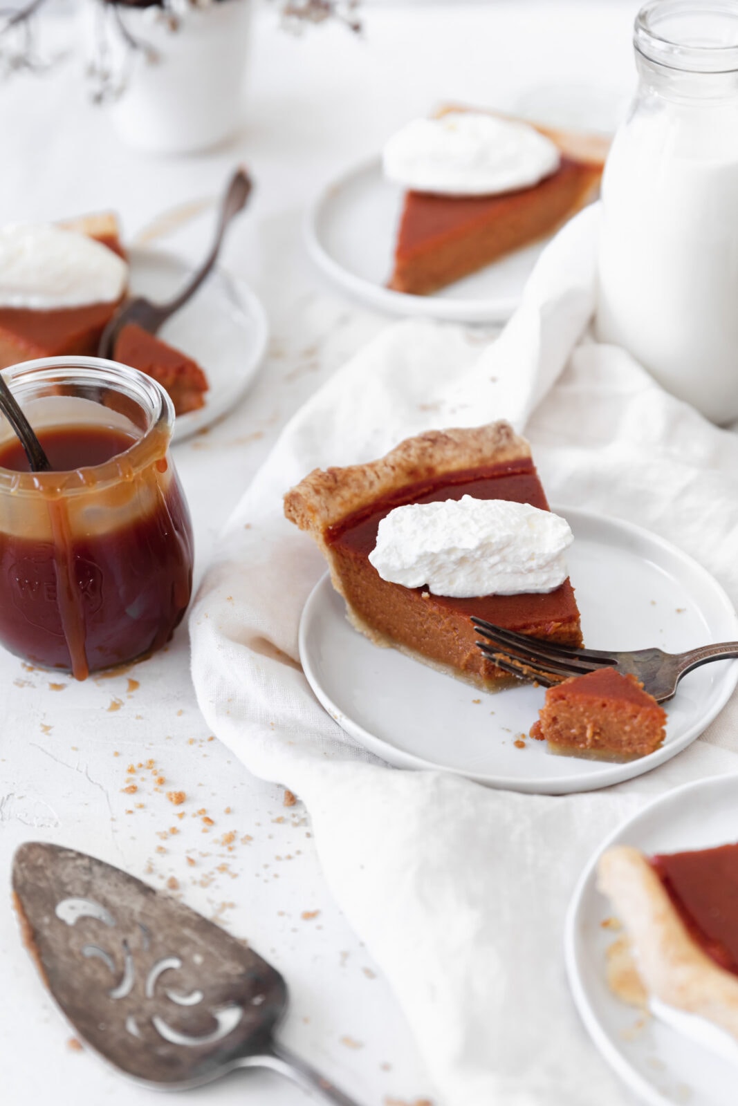 salted caramel pumpkin pie with whipped cream