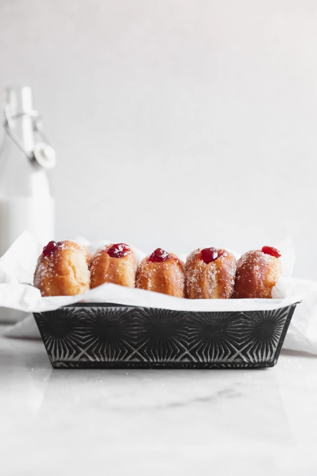 homemade jelly donuts in a pan