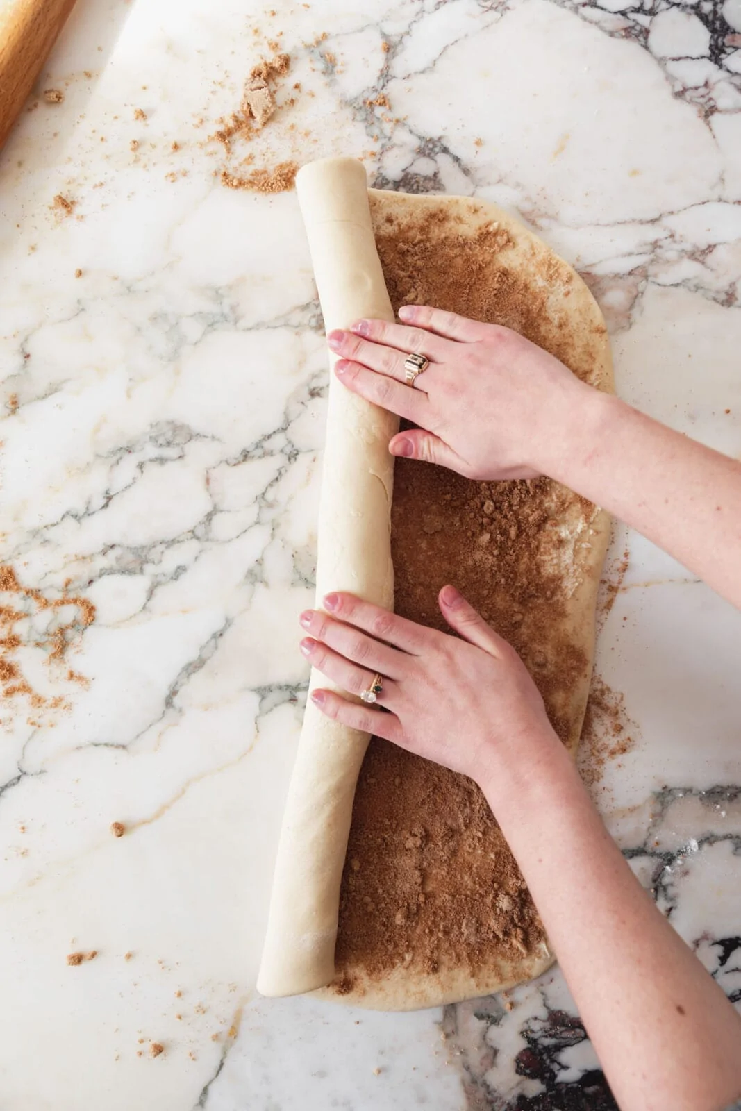 cinnamon roll dough rolling