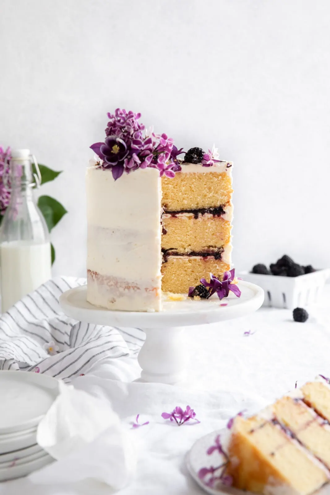 vanilla blackberry cake with blackberry filling and frosting