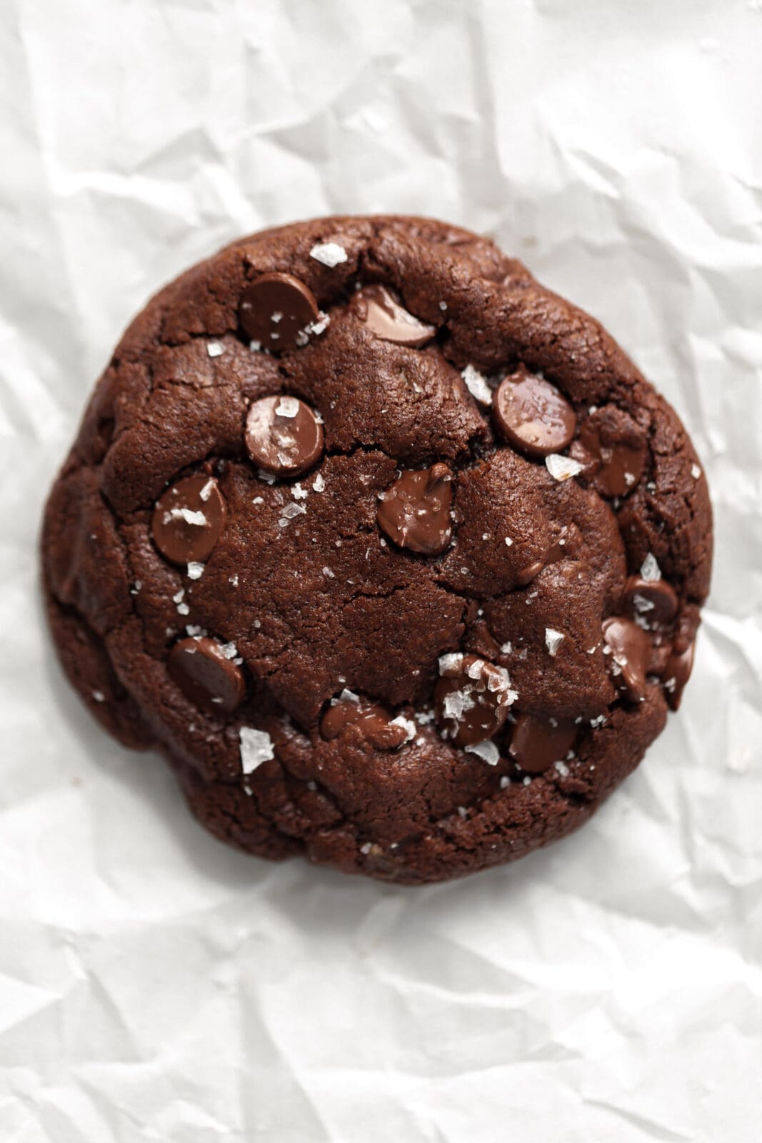 single serve double chocolate chip cookie on parchment paper
