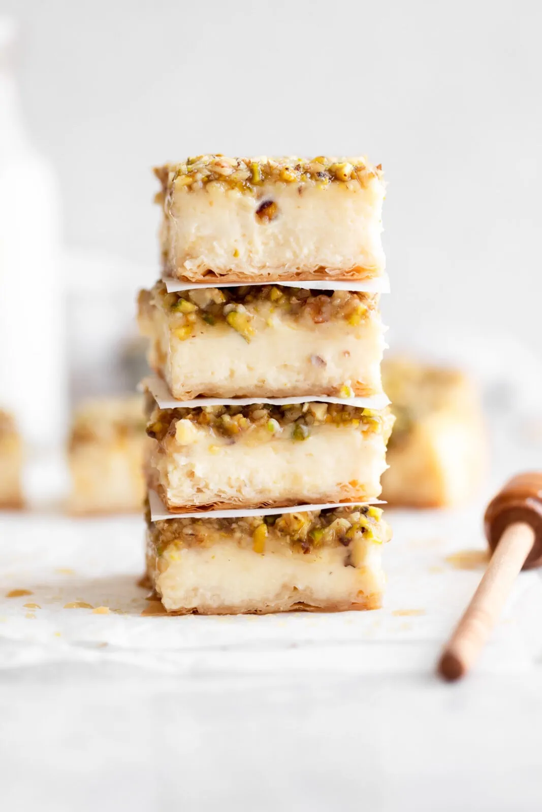 baklava cheesecake bars in a stack