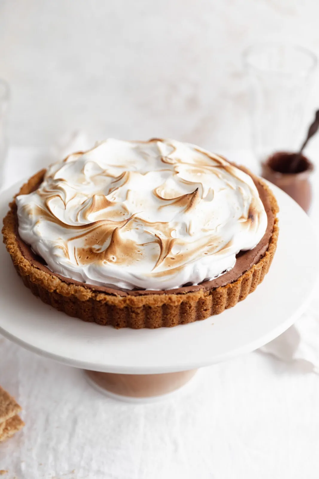 s'mores pie on cake stand