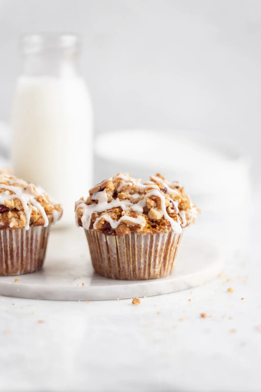 pumpkin muffins with streusel and a drizzle