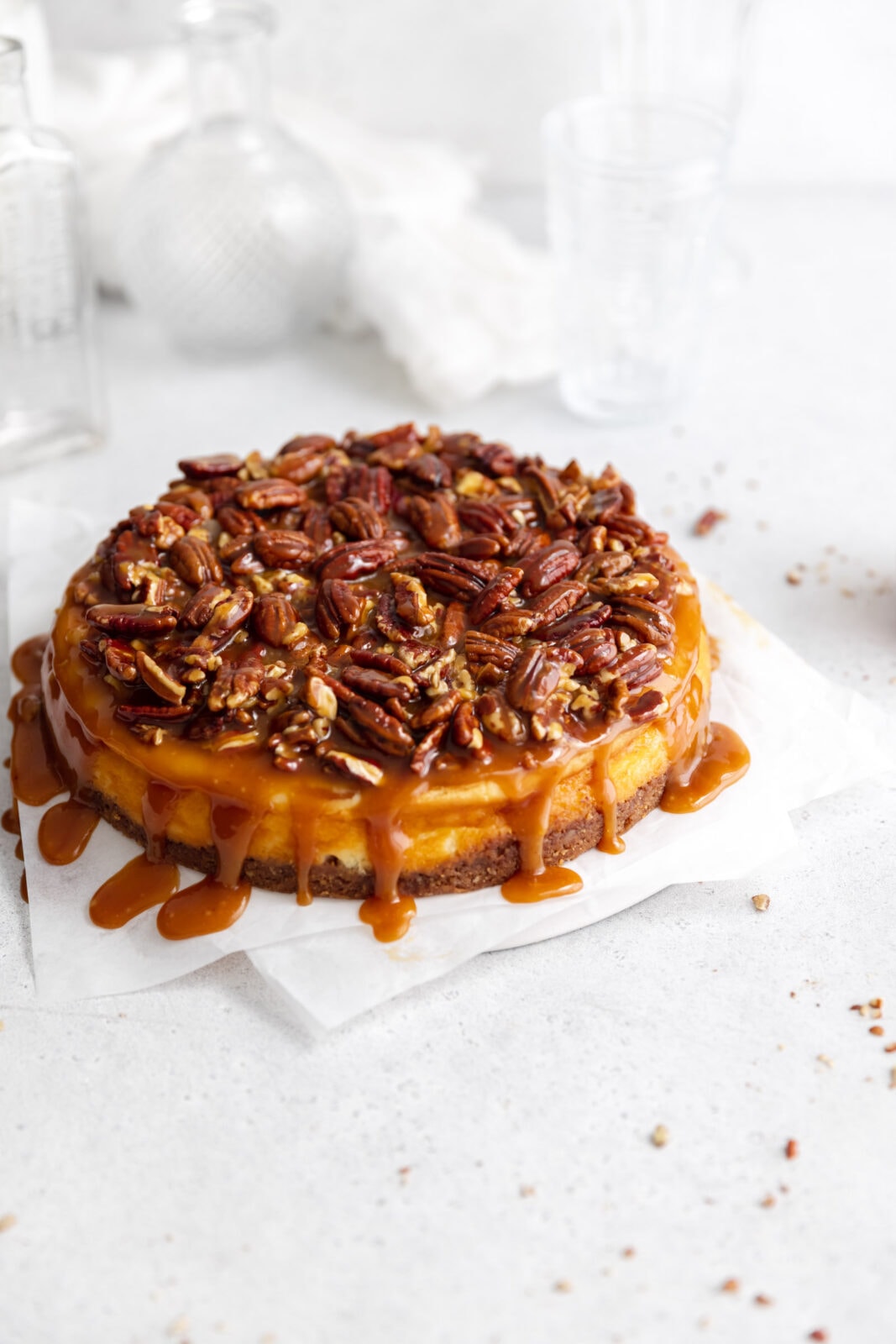 pecan pie cheesecake with salted caramel sauce