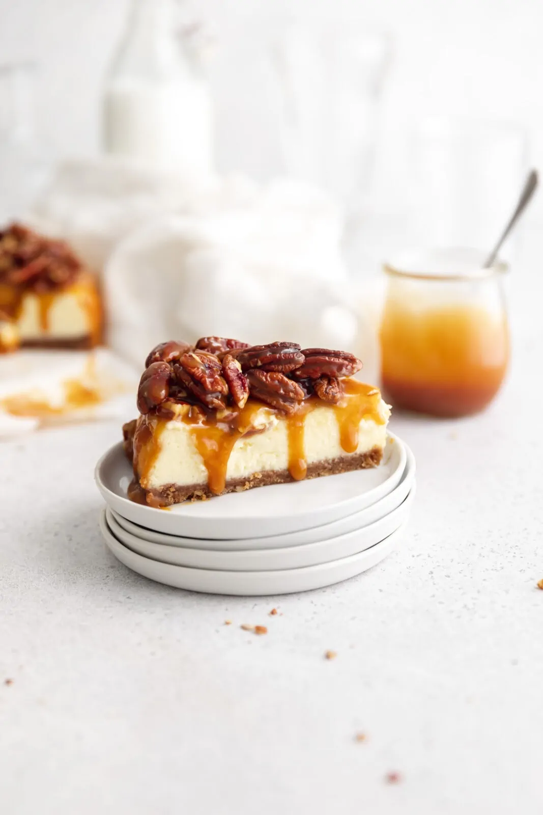 pecan pie cheesecake slice with salted caramel