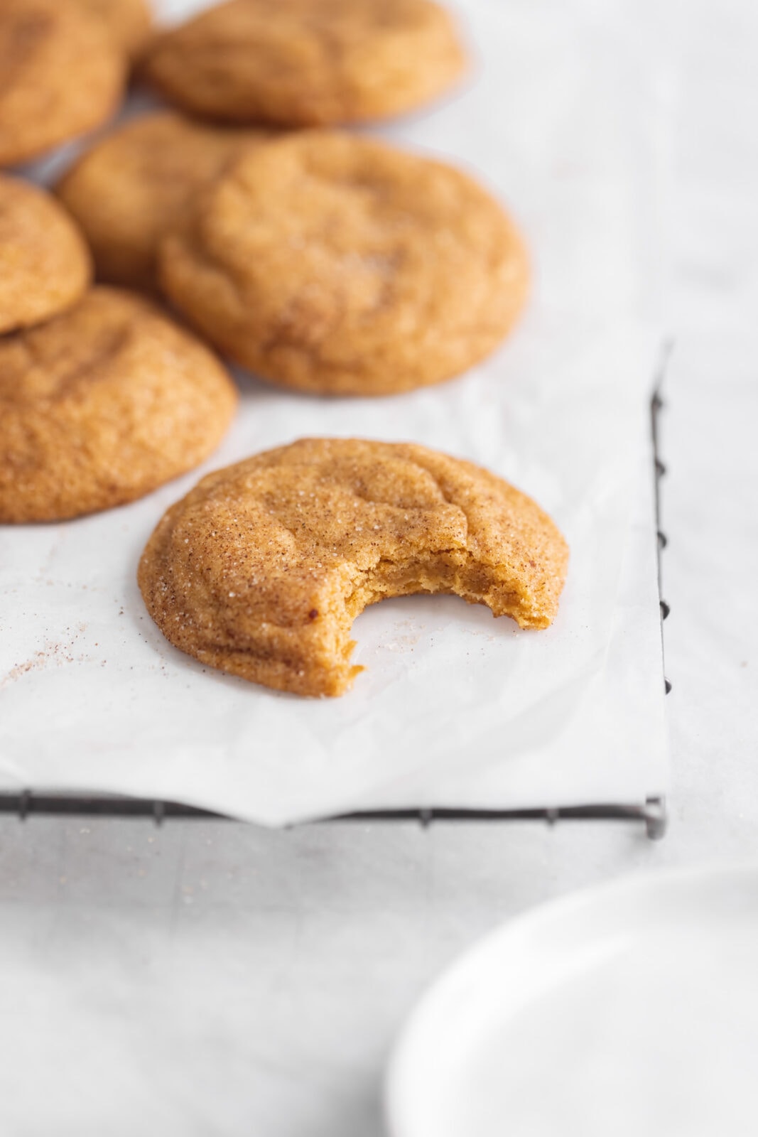 pumpkin snickerdoodles with a bite taken out