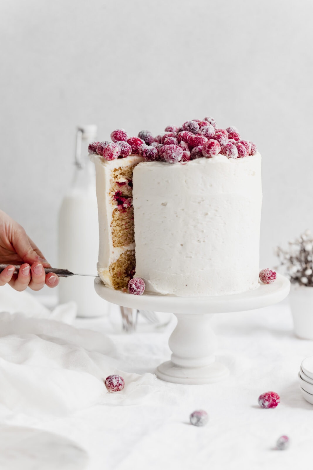 white chocolate cranberry cake with white chocolate frosting
