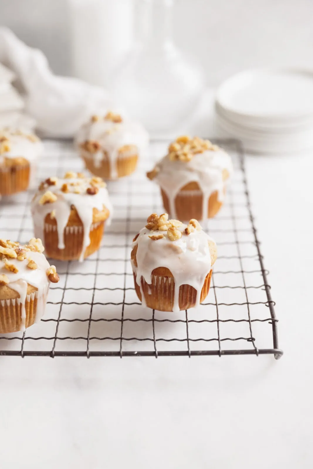 carrot cake muffins on a cooling rack