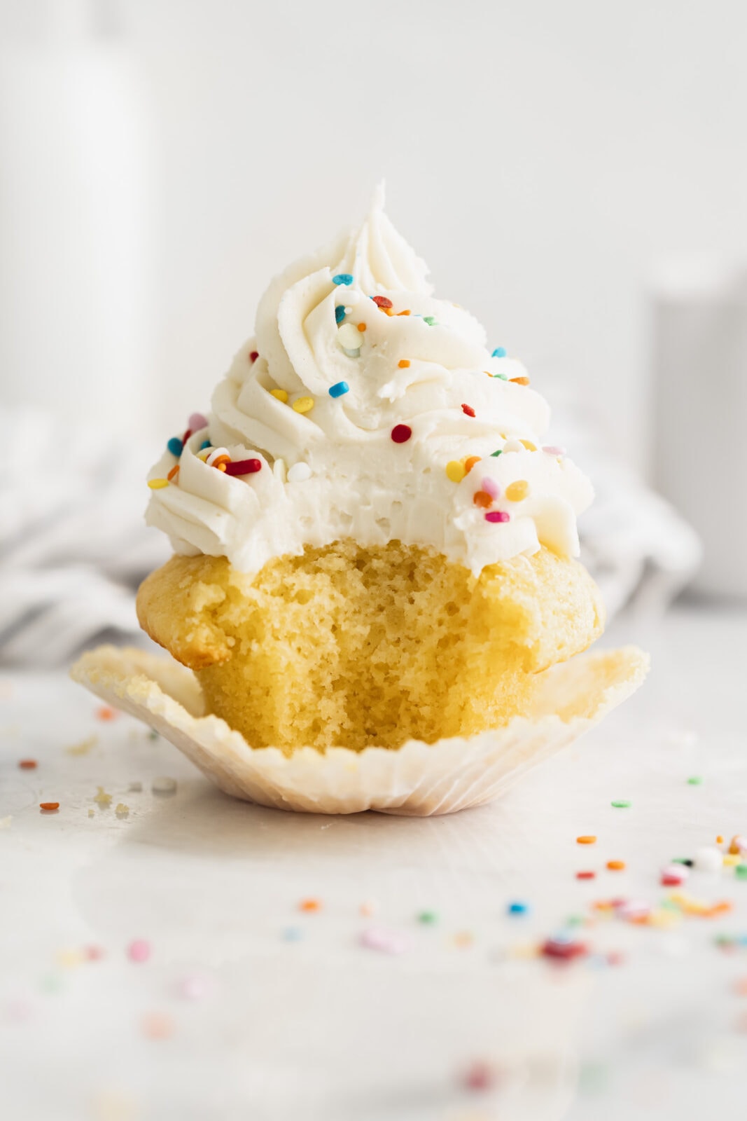 single serve vanilla cupcake with vanilla frosting