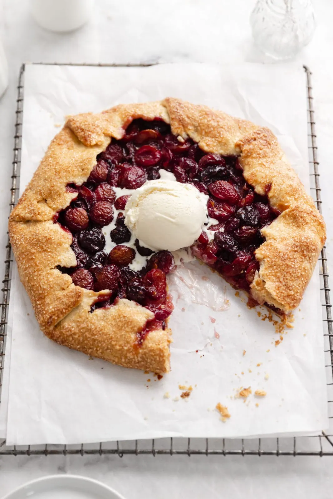 cherry galette on a cooling rack