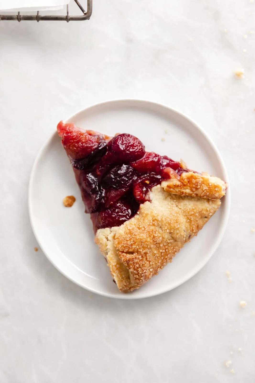 slice of cherry galette on a plate