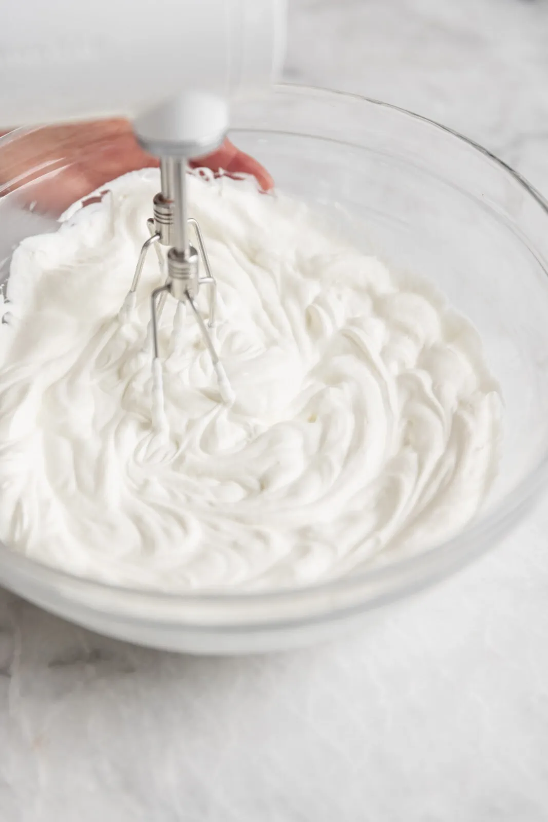 whipped cream being mixed