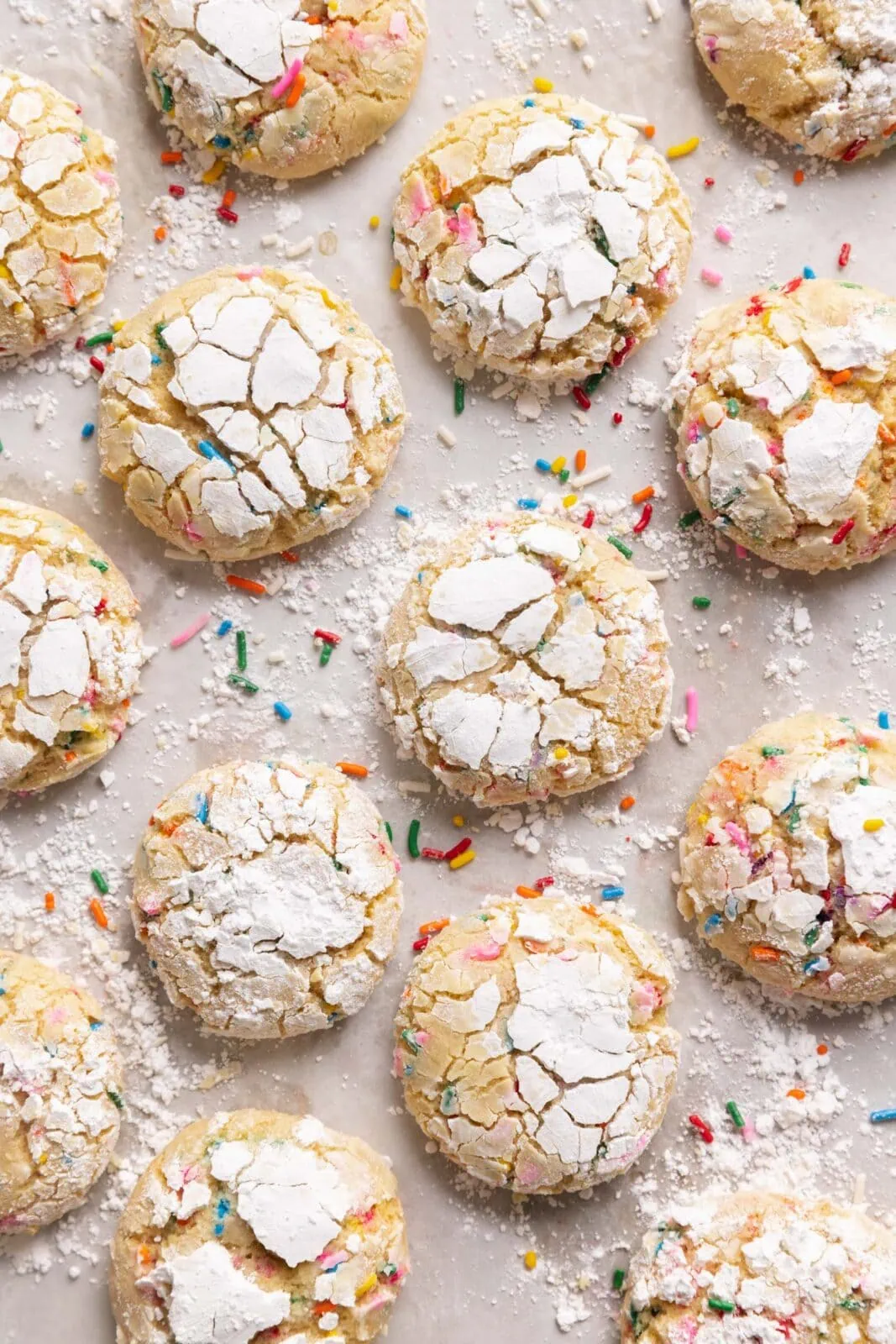 funfetti crinkle cookies on a cookie sheet