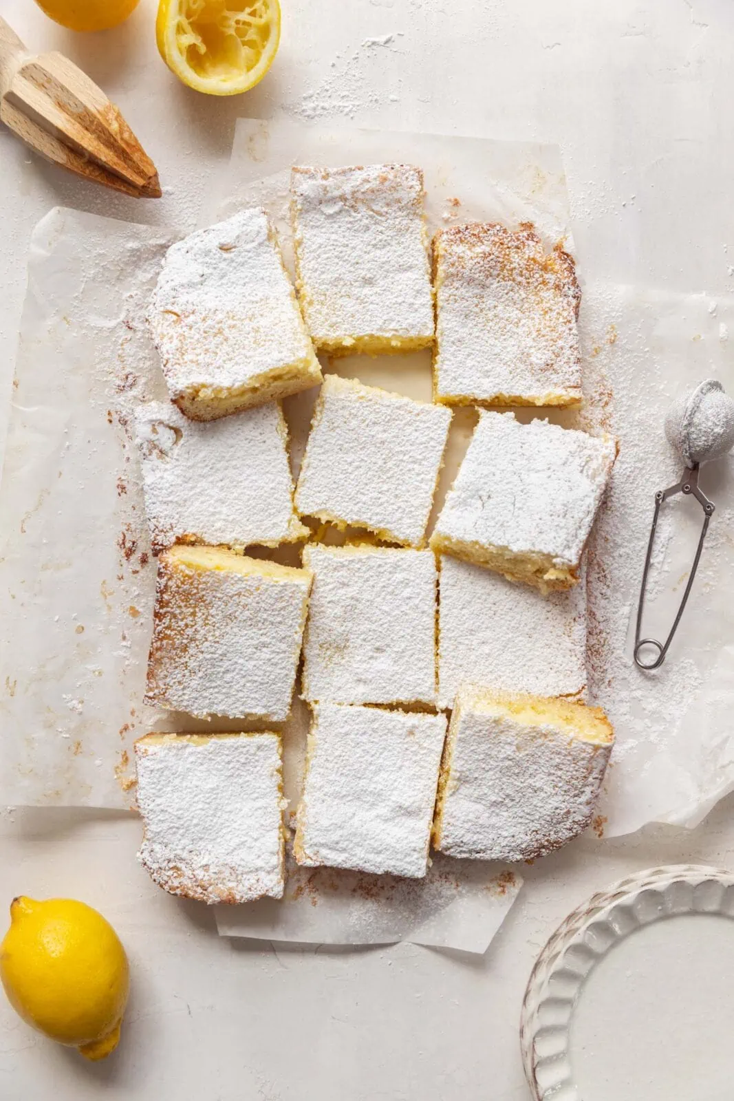 gooey lemon butter cake with powdered sugar and lemon juice