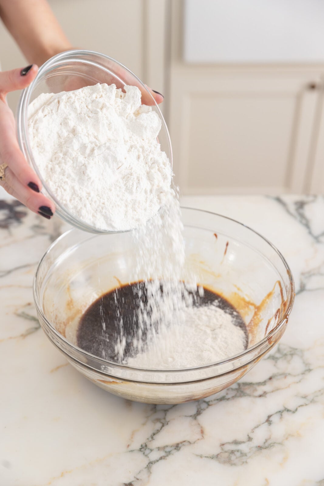 flour going into a bowl