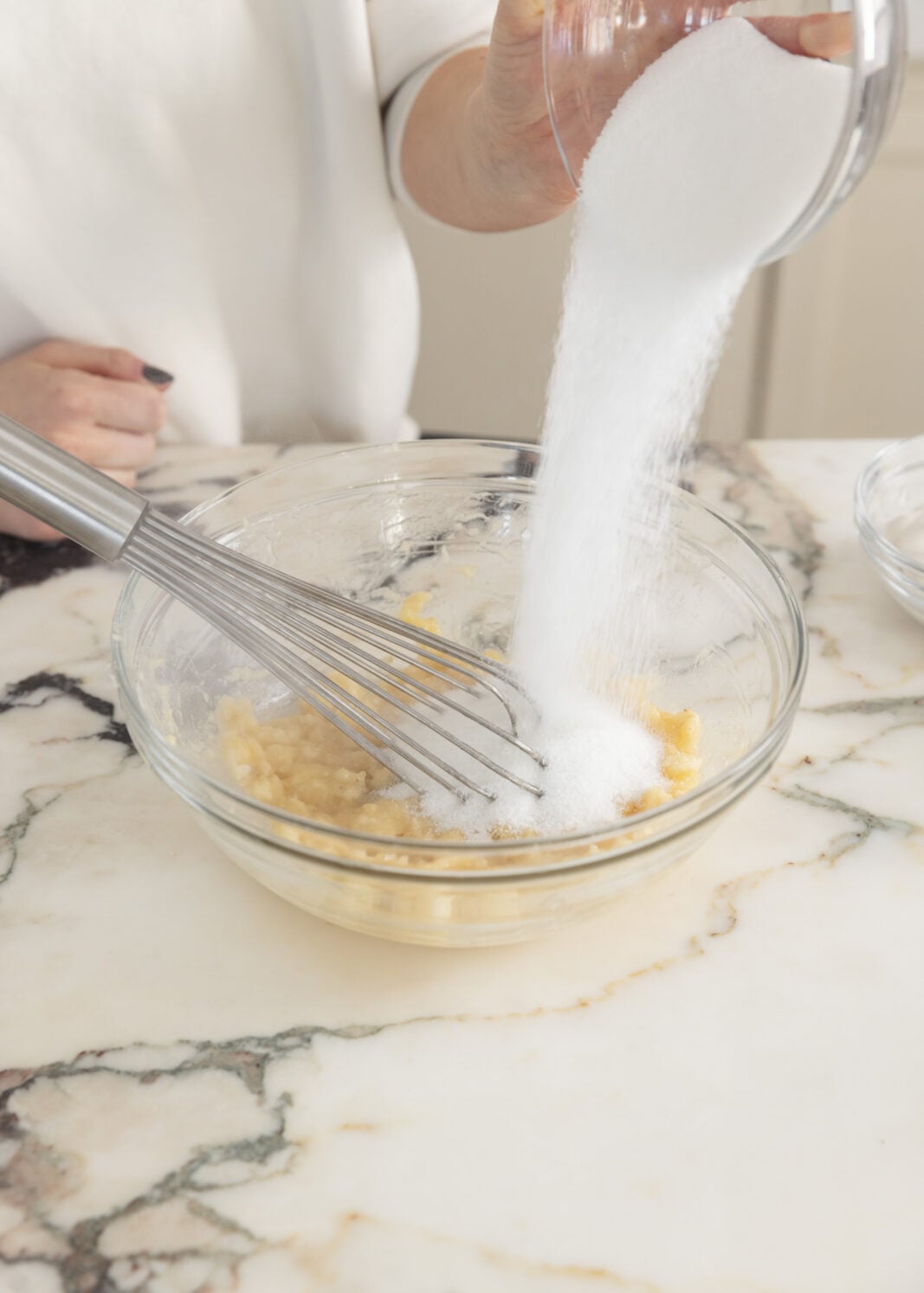 sugar going into bowl