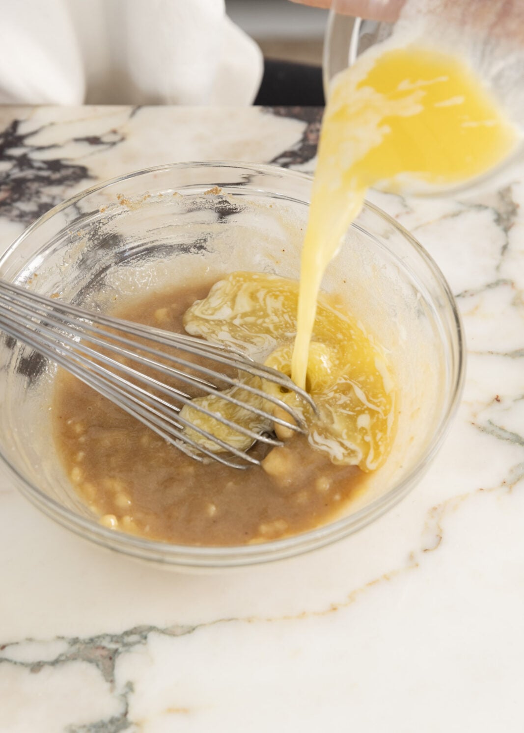 melted butter going into bowl