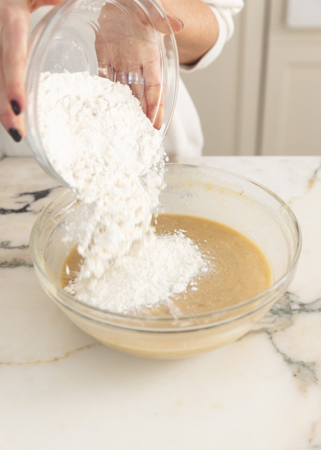 dry ingredients going into bowl