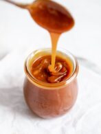 easy homemade caramel in a glass jar with a drip